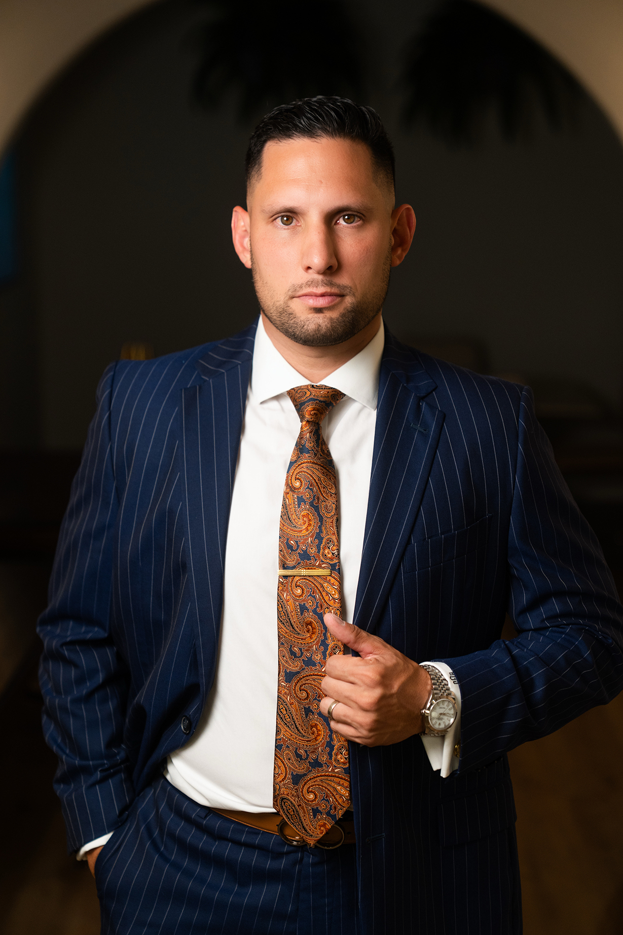 Anthony J. Gonzalez, Esq. standing in the office