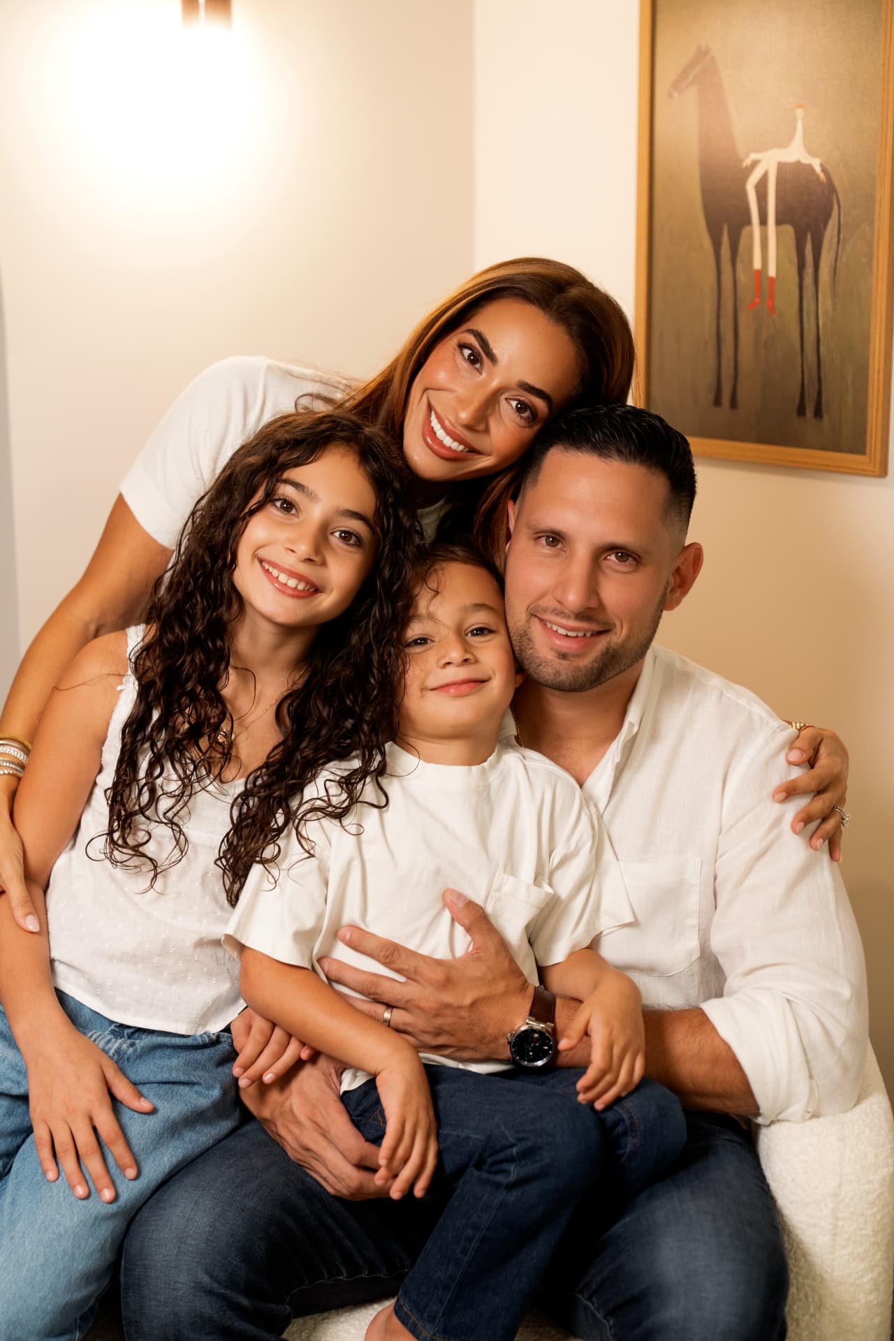 Anthony and Claudia Gonzalez with their children
