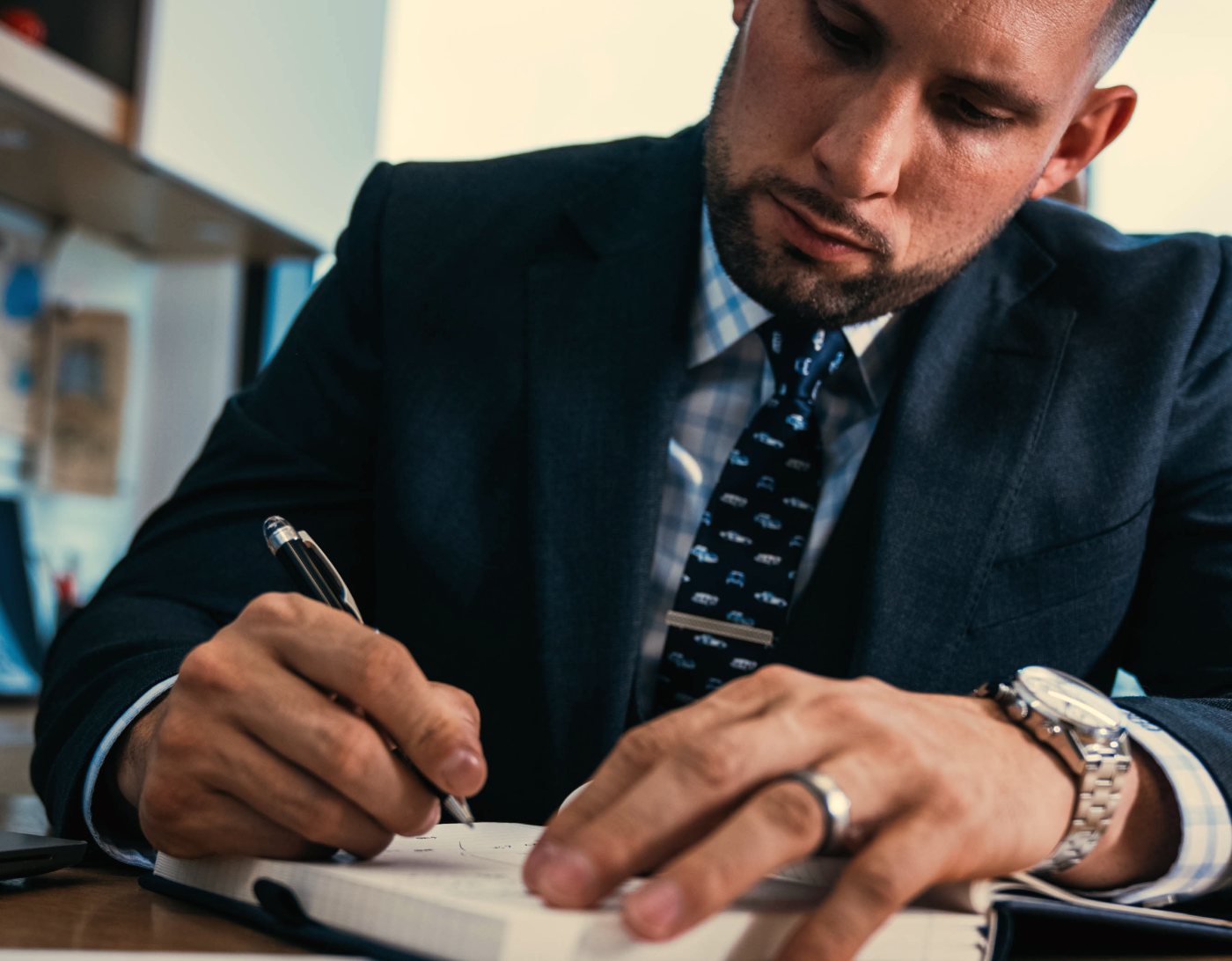 Anthony J. Gonzalez at his desk